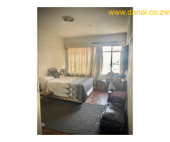 2 BEDROOMED FLAT FOR SALE IN WARBOROUGH MANSIONS BULAWAYO CBD